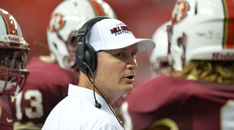 August 22, 2015 Atlanta - Mill Creek head coach Shannon Jarvis instructs in the second half of their game in the Corky Kell Classic at the Georgia Dome on Saturday, August 22, 2015. Mill Creek won 42 - 7 over the Brookwood. HYOSUB SHIN / HSHIN@AJC.COM