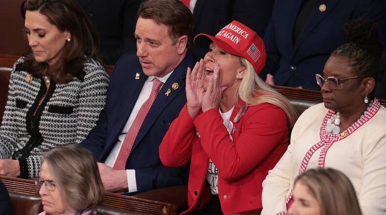 U.S. Rep. Marjorie Taylor Greene, R-Ga., calls out as President Joe Biden delivers the State of the Union address during a joint meeting of Congress in the House chamber at the U.S. Capitol on Thursday, March 7, 2024, in Washington, D.C. (Win McNamee/Getty Images/TNS)