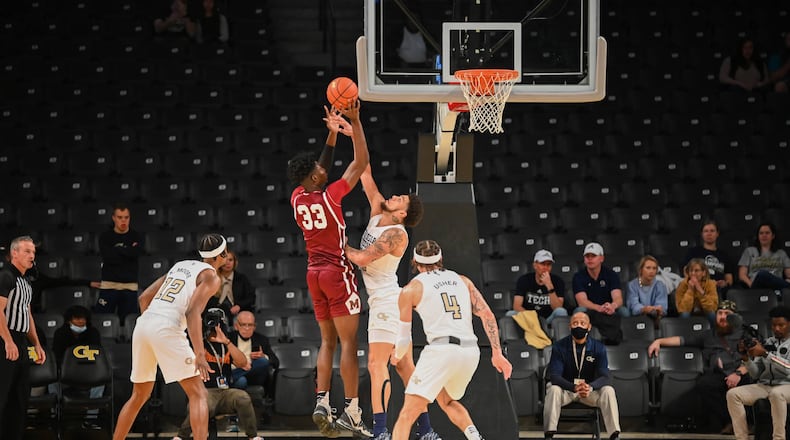 Georgia Tech center Rodney Howard challenges the shot of Morehouse center Olisa Akonobi in an exhibition Oct. 31, 2021 at McCamish Pavilion. Georgia Tech won 89-52. (Anthony McClellan)