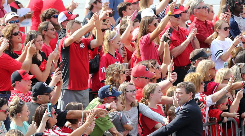 Fans greet Georgia coach Kirby Smart during a pregame “Dawg Walk.”