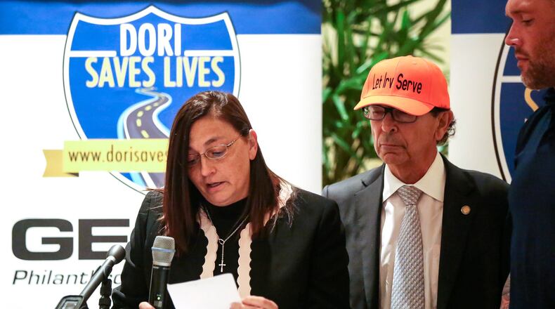Anna Morsaw (left) speaks during the Dori Saves Lives Foundation’s annual traffic safety awareness event — “Staying Alive on 95 & Florida’s Roadways” — in Boynton Beach Thursday, June 9, 2016. Morsaw is the mother of rising MMA star Jordan Parsons, who was killed by a hit-and-run driver in Delray Beach. “Words cannot express the loss that our family and friends have endured since Jordan’s passing,” she said. At center is Representative Irving Slosberg; at right is Neil Melanson. (Bruce R. Bennett / The Palm Beach Post)