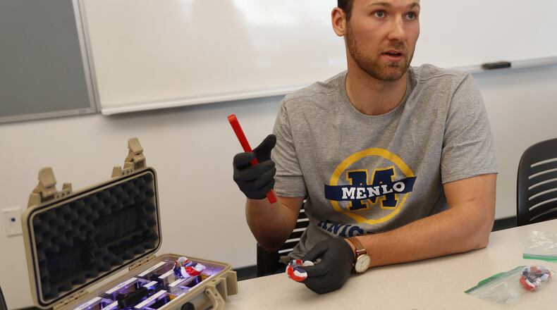 William Mehring, assistant clinical research coordinator for Stanford’s Center for Clinical Research, talks about a mouthguard with sensors built-in to help study concussions on football players at Menlo School in Atherton, Calif., on October 17, 2018. (Nhat V. Meyer/Bay Area News Group/TNS)