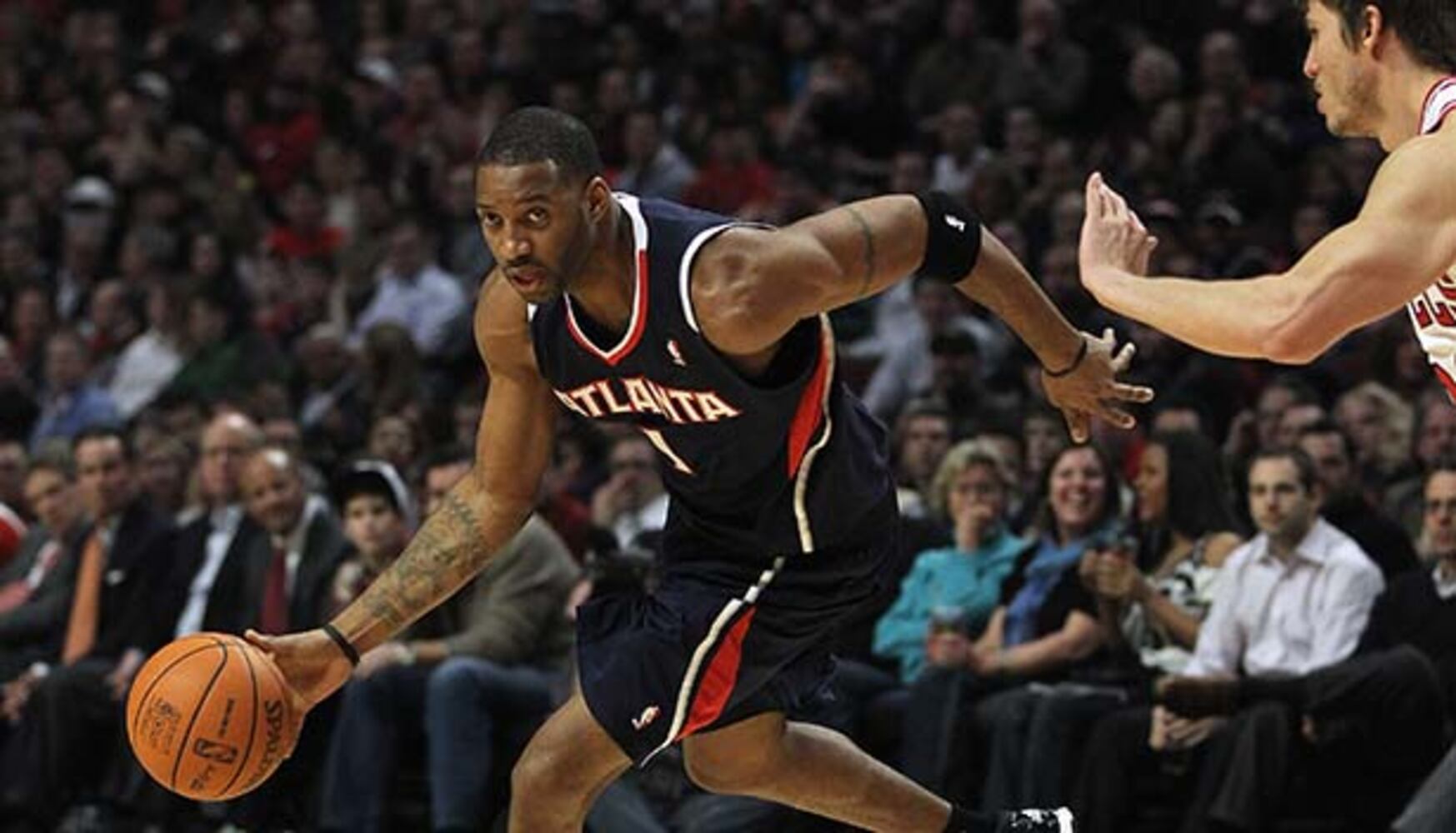 PHOTOS: Tracy McGrady retires from NBA at age 34