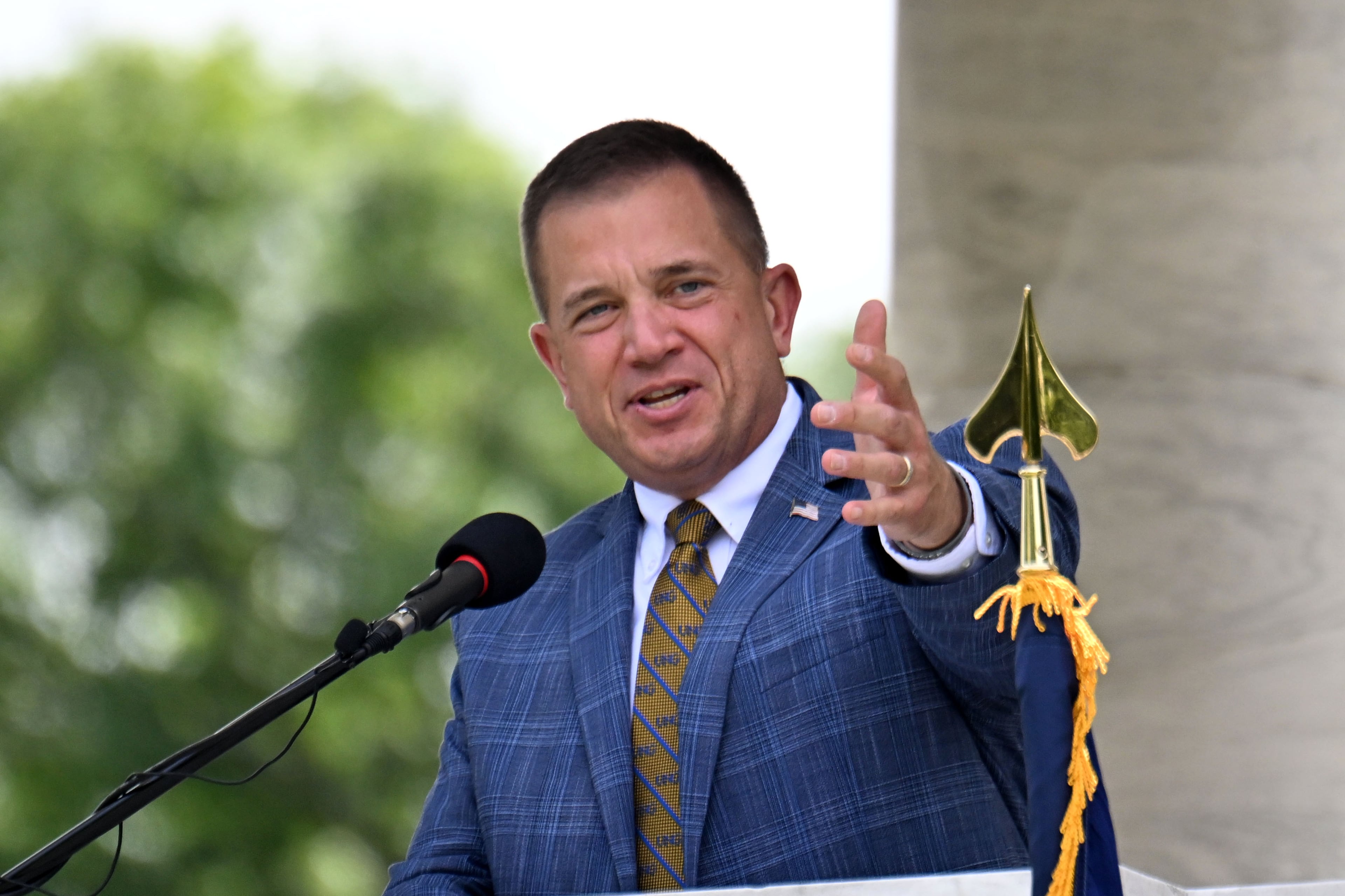 Michael Shannon, president of University of North Georgia, delivers Memorial Day address during the Memorial Day ceremony at Marietta National Cemetery, Monday, May 26, 2025, in Marietta. (Hyosub Shin / AJC)