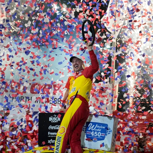 Joey Logano celebrates in Victory Lane after winning a NASCAR Cup Series auto race in North Wilkesboro, N.C., Sunday, July 19, 2026. (AP Photo/Chuck Burton)