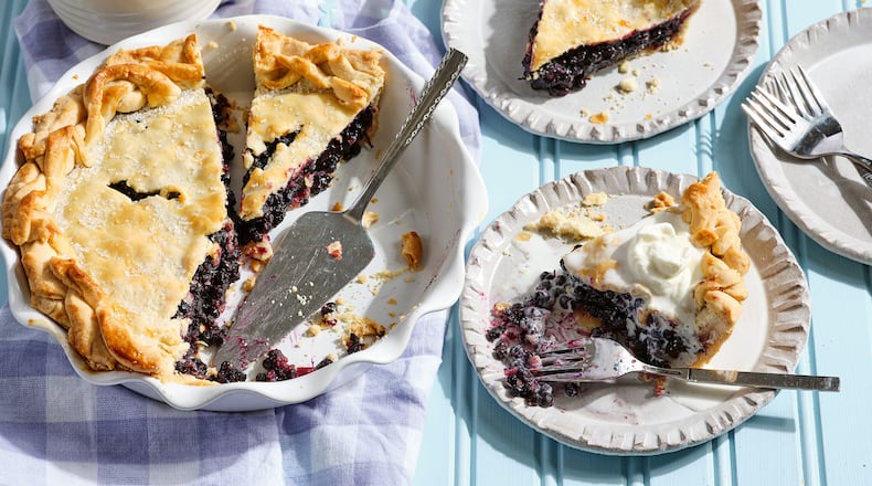 Blue Ribbon Ginger-Lime Wild Maine Blueberry Pie. "Photography (c) by Keller + Keller Photography from Blueberry Love (c) by Cynthia Graubart, used with permission from Storey Publishing."