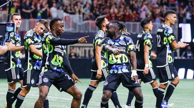 Atlanta United forward Edwin Mosquera (21) left, and midfielder Tristan Muyumba (8) dance after Mosquera scored his team’s third goal during the second half against Columbus Crew in Game 2 of a first-round MLS playoff game at Mercedes-Benz Stadium on Tuesday, Nov. 7, 2023.
Miguel Martinez / miguel.martinezjimenez@ajc.com