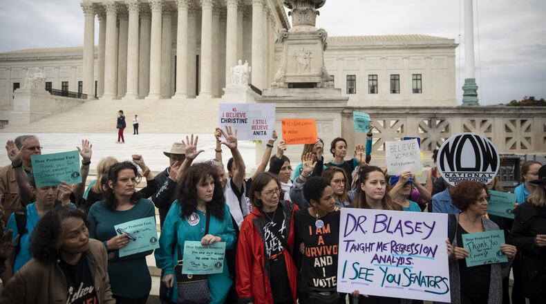 Protestors rally against Supreme Court nominee Judge Brett Kavanaugh outside the Supreme Court in Washington, DC. on Thursday. Drew Angerer/Getty Images
