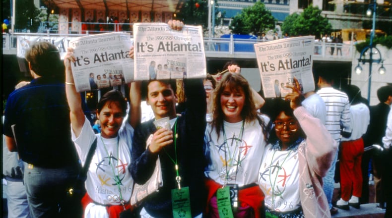 Atlantans cheer on Sept. 18, 1990, as their city is chosen for the 1996 Olympics. Courtesy of Atlanta History Center