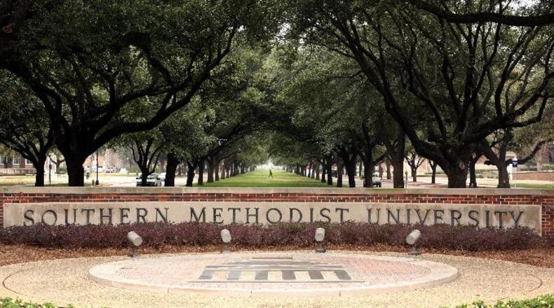 A student walks on the Southern Methodist University (SMU) campus January 23, 2007, in Dallas, Texas. (Photo by Brian Harkin/Getty Images)