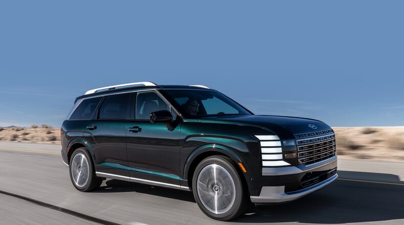 This photo provided by Hyundai shows the 2026 Palisade. The Palisade has been redesigned for 2026 and features new styling and a roomy interior fitted with premium features and materials. (Courtesy of Hyundai Motor America via AP)