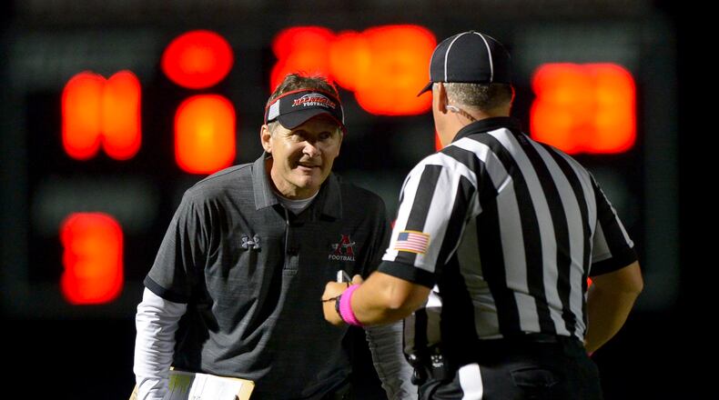 Allatoona head coach Gary Varner talks with a referee after a call in the second half of his game against Hapeville Charter Friday, October 12, 2018 at Allatoona High School. PHOTO/Daniel Varnado