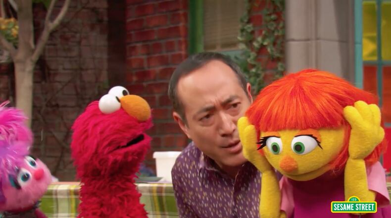 In a newly released video, Sesame Street friends learn that Julia, who has autism, does not like loud noises. Image: HBO/Sesame Street