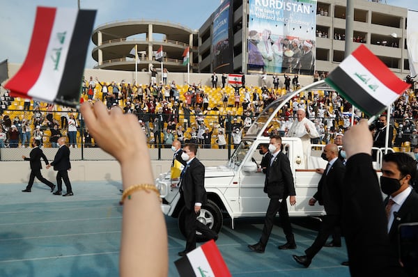 FILE.- Pope Francis waves as he arrives for an open air Mass at a stadium in Irbil, Iraq, Sunday, March 7, 2021. (AP Photo/Hadi Mizban,File)