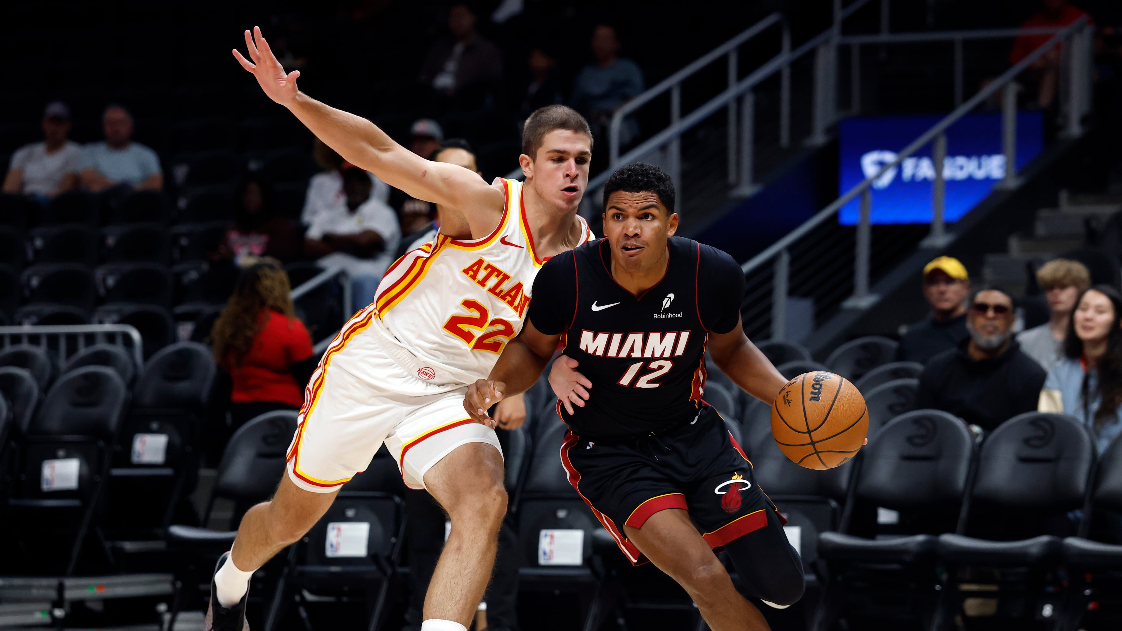 The Atlanta Hawks beat the Miami Heat 119-118 in exhibition play on Monday after the Caleb Houstan hit a 3-pointer at the buzzer. (Butch Dill/AP)