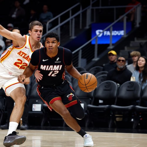 The Atlanta Hawks beat the Miami Heat 119-118 in exhibition play on Monday after the Caleb Houstan hit a 3-pointer at the buzzer. (Butch Dill/AP)