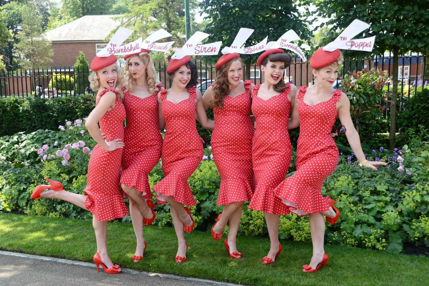 Race goers show hat styles