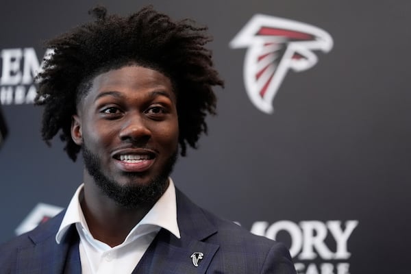 Atlanta Falcons first-round draft pick Jalon Walker speaks during a news conference, Friday, April 25, 2025, in Flowery Branch, Ga. (AP Photo/Brynn Anderson,)