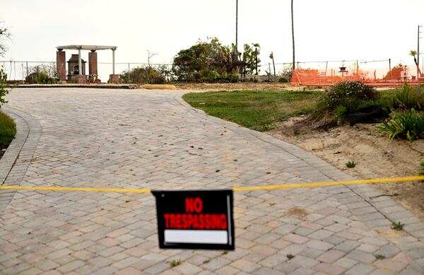 An empty lot sits alone along Old Coach Drive after the Mountain Fire burned through the area Wednesday, April 16, 2025, in Camarillo, Calif. (AP Photo/Wally Skalij)