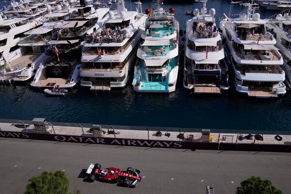 Ferrari driver Charles Leclerc of Monaco steers his car during the second free practice ahead of the Formula One Monaco Grand Prix race at the Monaco racetrack in Monaco, Friday, May 23, 2025. (AP Photo/Manu Fernandez)