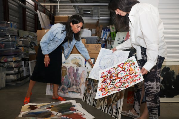 Georgia Robert Parmelee and Birney Robert recall their mother Susan bringing them to her Atlanta College of Art classes when childcare fell through. She graduated at age 47 and went on to an accomplished painting career. (Jason Getz/AJC)