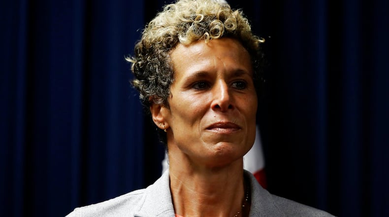 Accuser Andrea Constand reacts at a news conference after Bill Cosby was sentenced to three-to 10-years for sexual assault Tuesday, Sept. 25, 2018, in Norristown, Pa. (AP Photo/Matt Slocum)
