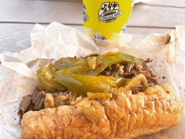 You can add peppers to your Italian beef sandwich at Al’s #1 Italian Beef. John Kessler for The Atlanta Journal-Constitution