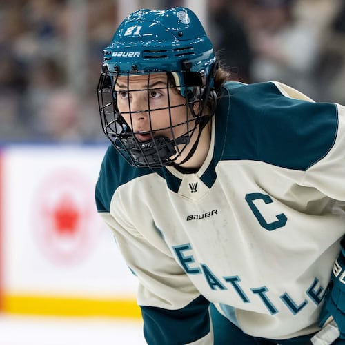 FILE - Seattle Torrent's Hilary Knight (21) waits for a face off against the Vancouver Goldeneyes during the second period of a PWHL hockey game in Vancouver, on Tuesday, April 14, 2026. (Ethan Cairns/The Canadian Press via AP,File)