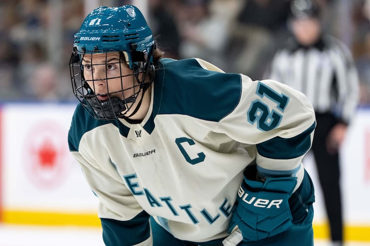 FILE - Seattle Torrent's Hilary Knight (21) waits for a face off against the Vancouver Goldeneyes during the second period of a PWHL hockey game in Vancouver, on Tuesday, April 14, 2026. (Ethan Cairns/The Canadian Press via AP,File)