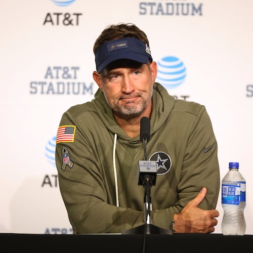 Dallas Cowboys head coach Brian Schottenheimer takes questions during a news conference after an NFL football game against the Arizona Cardinals Monday, Nov. 3, 2025, in Arlington, Texas. (AP Photo/Richard Rodriguez)