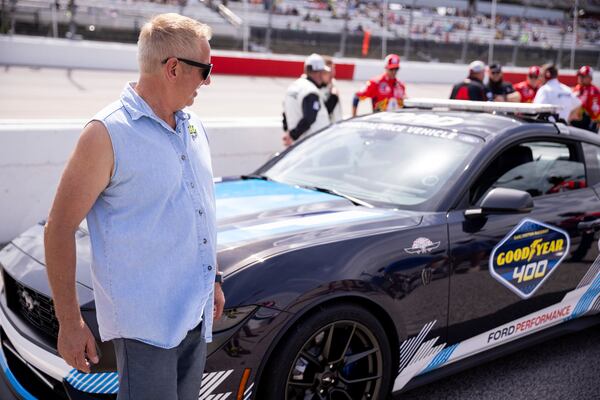 Former driver Greg Biffle checks out the pace car before the start of a NASCAR Cup Series auto race at Darlington Raceway, Sunday, April 6, 2025, in Darlington, S.C. (AP Photo/Scott Kinser)