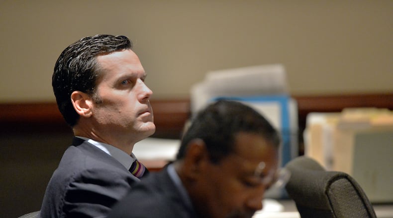 Rick Warren, the Buckhead investor who has bought up some 10 percent of Atlanta’s English Avenue neighborhood, appears with his defense attorney George Lawson before Atlanta Municipal Court Judge Crystal Gaines, Wednesday May 27, 2015. Warren faces 17 charges of various violations of Atlanta codes. As a habitual offender, a conviction would mean jail time. In this most recent case, code enforcement officers say he left a burnt-out house open, vacant and overgrown. He owns at least 100 properties through a half-dozen or more LLCs, many of them crumbling under his ownership. KENT D. JOHNSON /KDJOHNSON@AJC.COM