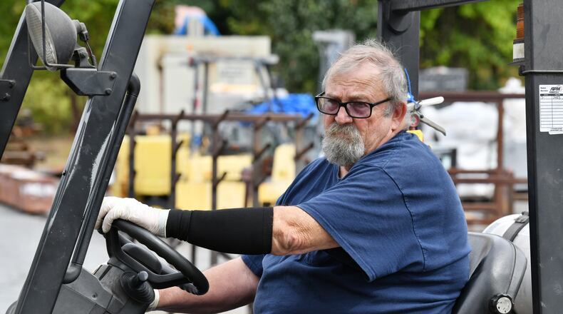 October 7, 2021 Fairburn - Bill O'Neal drives his fork lift around the plant at Aalberts surface technologies in Fairburn on Thursday, October 7, 2021. Bill O'Neal has worked at the plant for 20 years. Last year his hours were cut as orders slowed down due to the pandemic. While others in the plant got benefits from DOL, O'Neal is still waiting because of a paperwork problem with his claim. (Hyosub Shin / Hyosub.Shin@ajc.com)