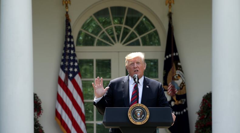 President Donald Trump speaks about his immigration proposal Thursday in the Rose Garden of the White House. The plan calls for a merit-based system that prioritizes high-skilled workers over those with family already in the country. It does not address young immigrants who are part of the Deferred Action for Childhood Arrivals program. (Photo by Alex Wong/Getty Images)