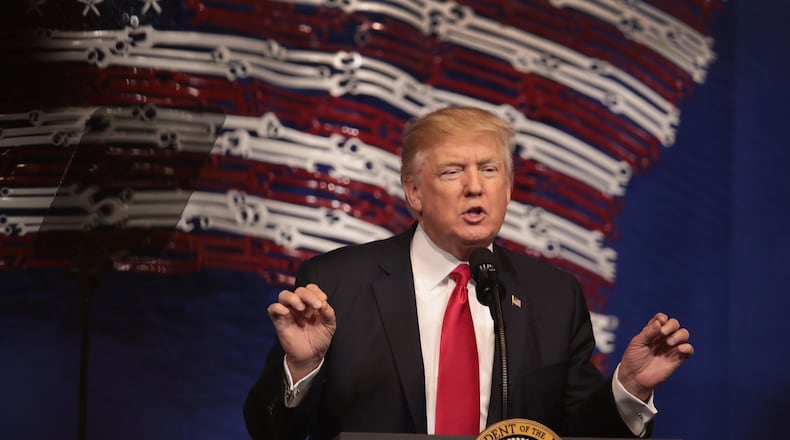KENOSHA, WI - APRIL 18: President Donald Trump speaks to workers at the headquarters of tool manufacturer Snap-On on April 18, 2017 in Kenosha, Wisconsin. During the visit, Trump signed an executive order to try to bring jobs back to American workers and revamp the H-1B visa guest worker program. (Photo by Scott Olson/Getty Images)