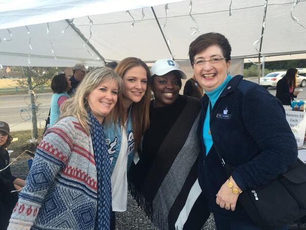 Dorie Griggs (far right) with Citadel moms Kim Wittman (left), Brantley Harrison and Pamela McCloud. The women are part of the group named The Citadel: Parents of the Class of 2020 Facebook group. They met in person at the tailgate at a home football game in December. CONTRIBUTED