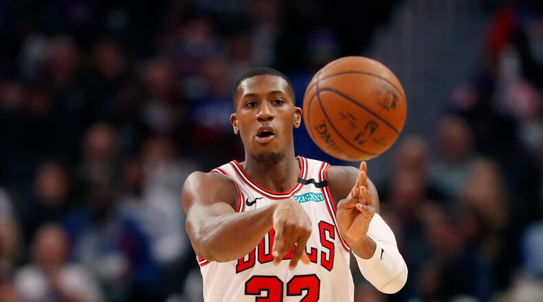 Chicago Bulls guard Kris Dunn passes during the second half of an NBA basketball game, Saturday, Jan. 11, 2020, in Detroit. (AP Photo/Carlos Osorio)