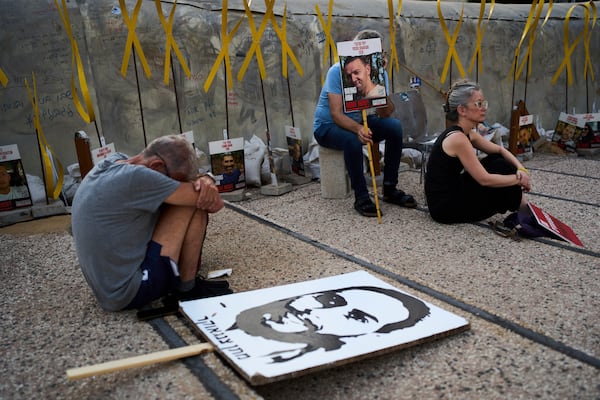 Relatives and supporters of Israeli hostages held in the Gaza Strip attend a rally demanding their release from Hamas captivity and calling for an end to the war, in Tel Aviv, Israel, Saturday, July 12, 2025. (AP Photo/Oded Balilty)