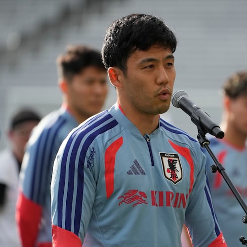 Japan's Wataru Endo addresses fans before a training session Monday, June 8, 2026, in Nashville, Tenn., ahead of the World Cup soccer tournament. (AP Photo/George Walker IV)