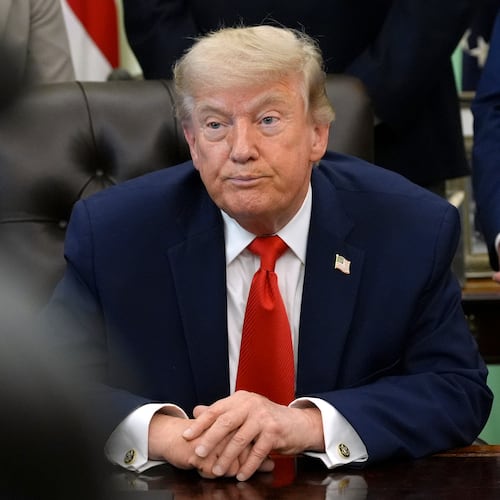 President Donald Trump listens during an event to sign a proclamation about the fishing industry, in the Oval Office of the White House, Thursday, June 11, 2026, in Washington. (AP Photo/Jacquelyn Martin)