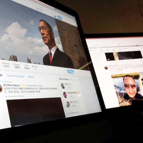 FILE - A Twitter page of Chinese exiled businessman Guo Wengui is seen on a computer screen in Beijing, Aug. 30, 2017. (AP Photo/Andy Wong, File)