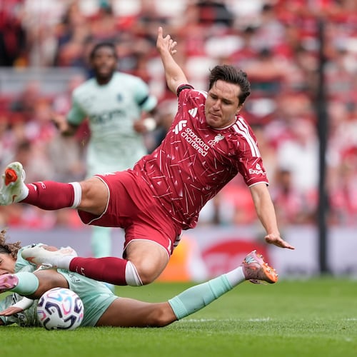 Monaco's Anis Soubeir and Liverpool's Federico Chiesa, right, in action during the pre-season friendly soccer match between Liverpool and AS Monaco in Liverpool, England, Sunday Aug. 9, 2026. (Peter Byrne/PA via AP)