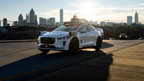 Georgia law is murky when it comes to holding driverless vehicles responsible for traffic violations. State law does not identify Waymo or an autonomous vehicle as a driver, only that an automated driving system is allowed to operate without a human driver. (Ben Hendren for the AJC)