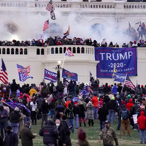 FILE - Rioters supporting President Donald Trump storm the Capitol in Washington, Jan. 6, 2021. (AP Photo/John Minchillo, File)