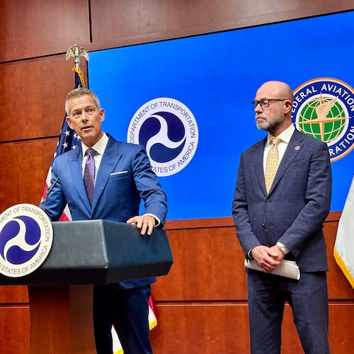 Transportation Secretary Sean Duffy, left, speaks at a news conference with FAA administrator Bryan Bedford to announce flight cancellations across the country because of the government shutdown Wednesday, Nov. 5, 2025 at the U.S. Department of Transportation headquarters in Washington. (AP Photo/Matthew Daly)