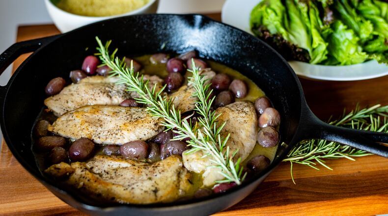 “Roast” Chicken with Grapes and Rosemary. Henri Hollis/For The AJC