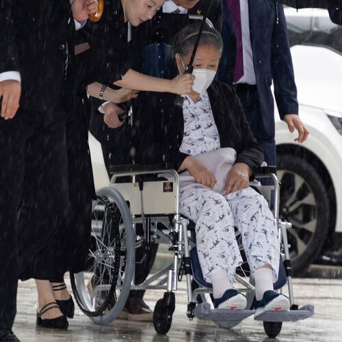 Unification Church leader Hak Ja Han, on the wheelchair, arrives for the sentencing hearing on allegations of bribery and political funding, at the Seoul Central District Court in Seoul, South Korea, Monday, Aug. 31, 2026. (Jeon Heon-kyun/Pool Photo via AP)