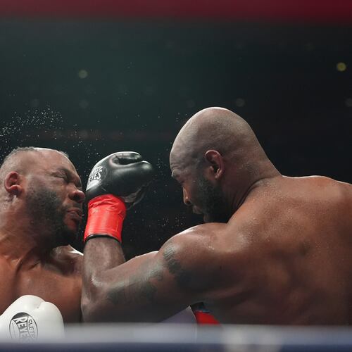 Kingsley Ibeh, right, punches Jarrell Miller during a heavyweight boxing match Saturday, Jan. 31, 2026, in New York. (AP Photo/Frank Franklin II)