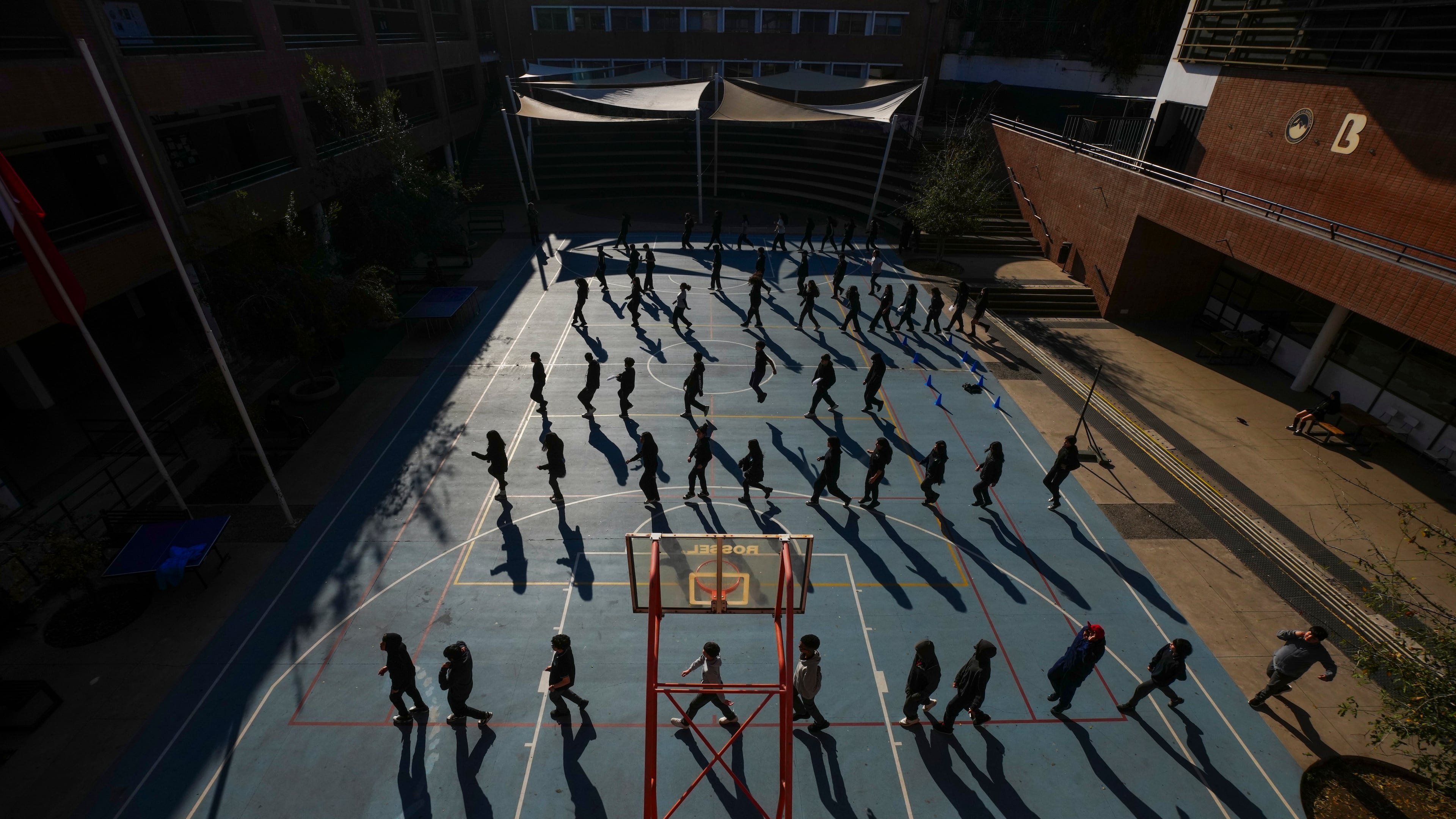 Students rehearse for an event to celebrate Chile's Independence at the Bicentenario School in Santiago, Chile, Monday, Sept. 8, 2025. (AP Photo/Esteban Felix)