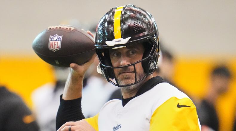 Pittsburgh Steelers quarterback Aaron Rodgers (8) throws during NFL football practice in Pittsburgh, Wednesday, May 20, 2026. (AP Photo/Gene J. Puskar)